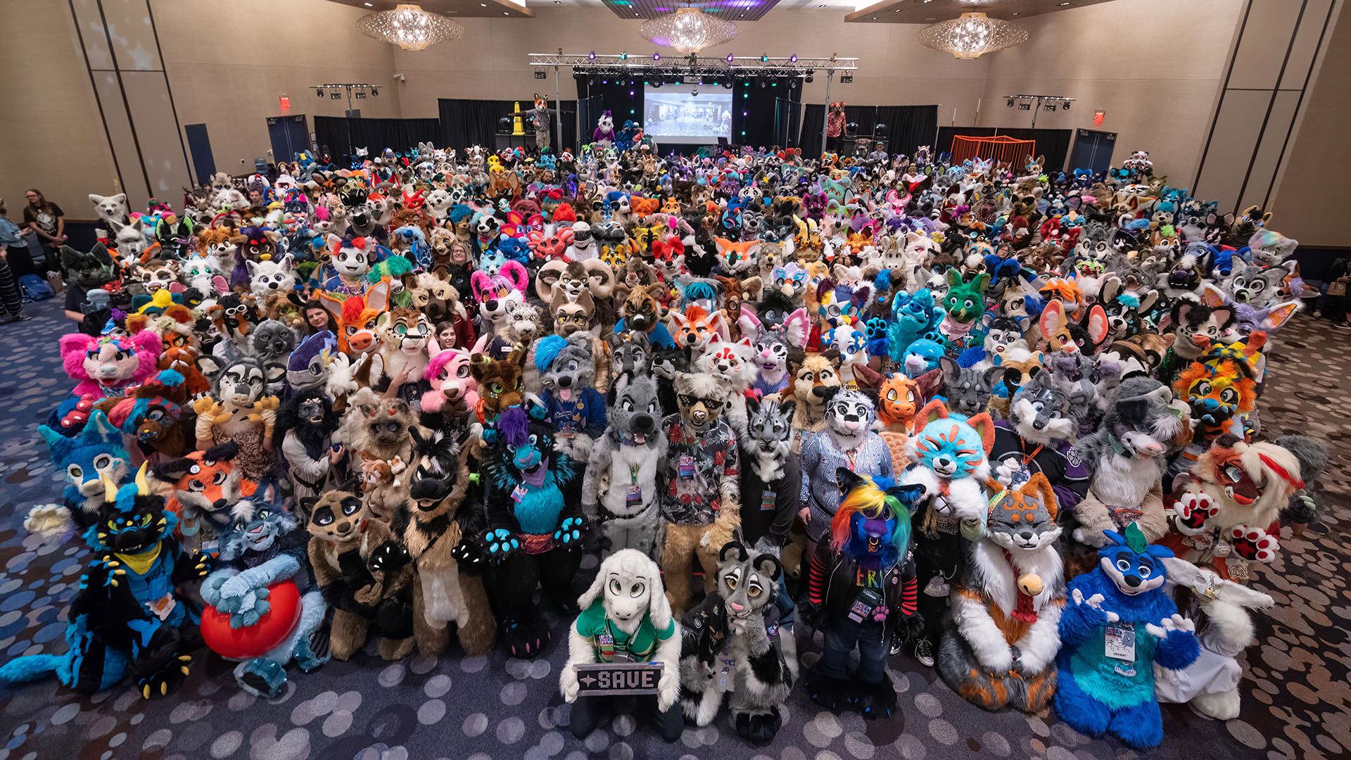 Fursuiters posing in their suits at Furry Migration 2023